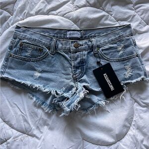 That’s So Fetch Women's Ripped Jean Shorts - Light Blue